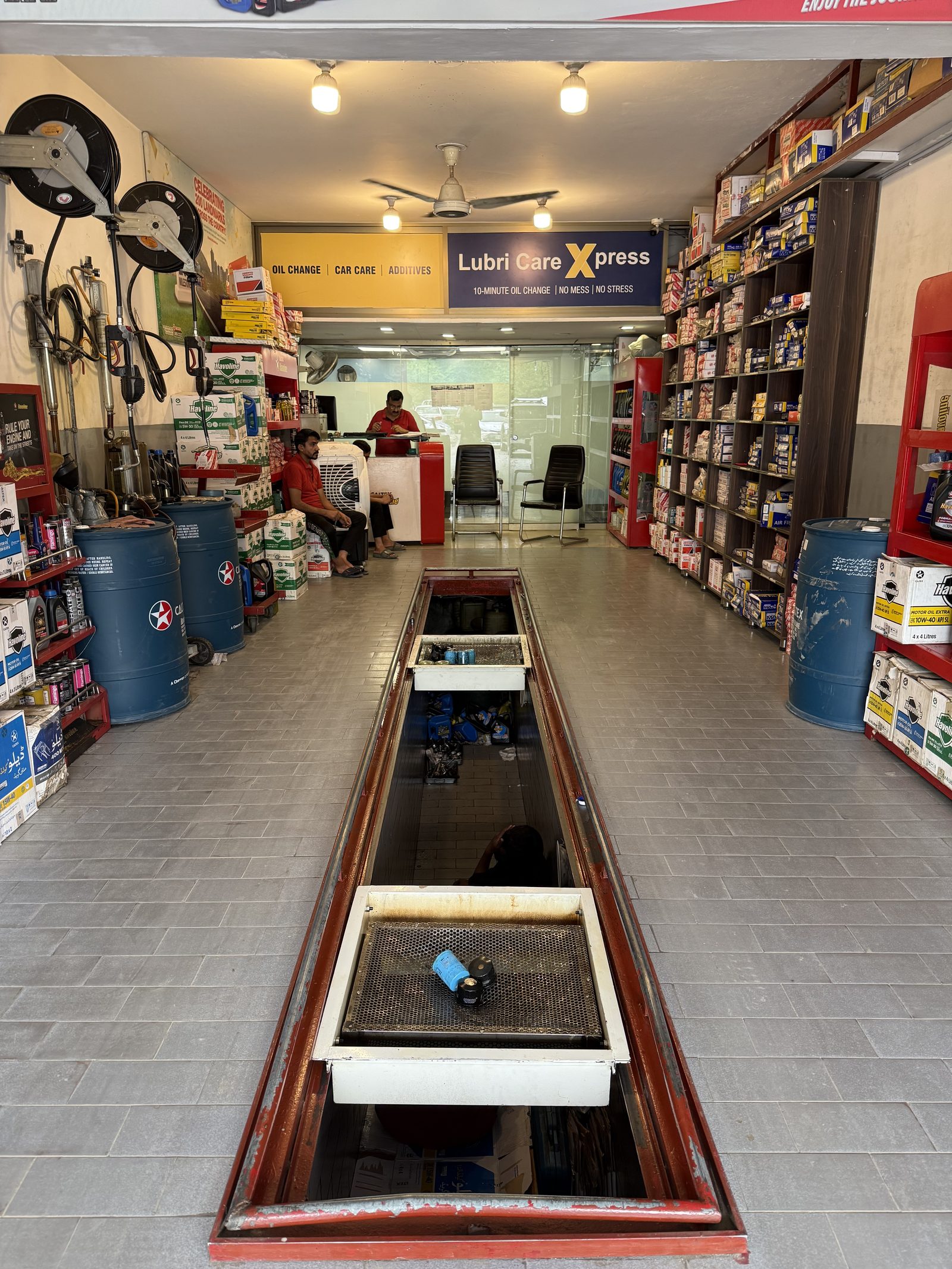 Inside the Lubri Care Xpress drive-through bay at G-8 Markaz, Islamabad