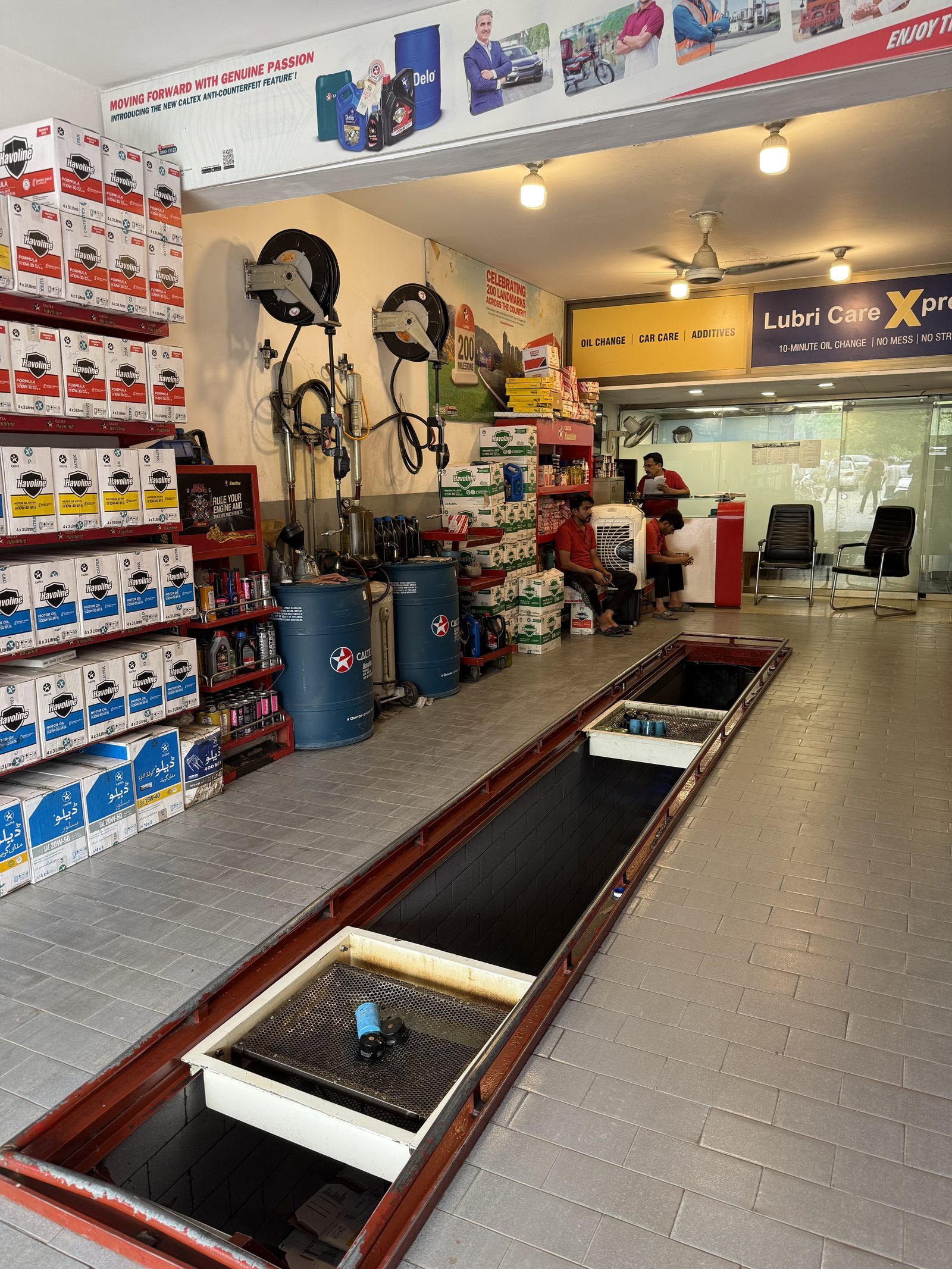 Caltex genuine product and anti-counterfeit signage at Lubri Care Xpress
