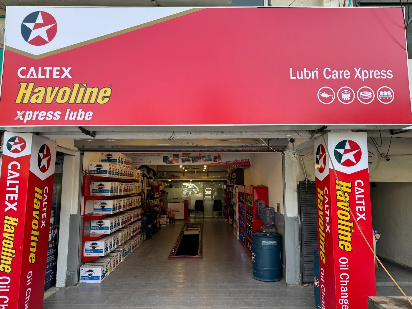 Lubri Care Xpress storefront signage at G-8 Markaz, Islamabad